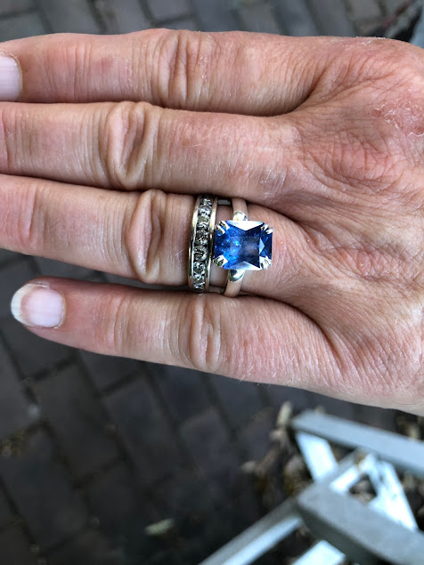 Client reviewing gemstones